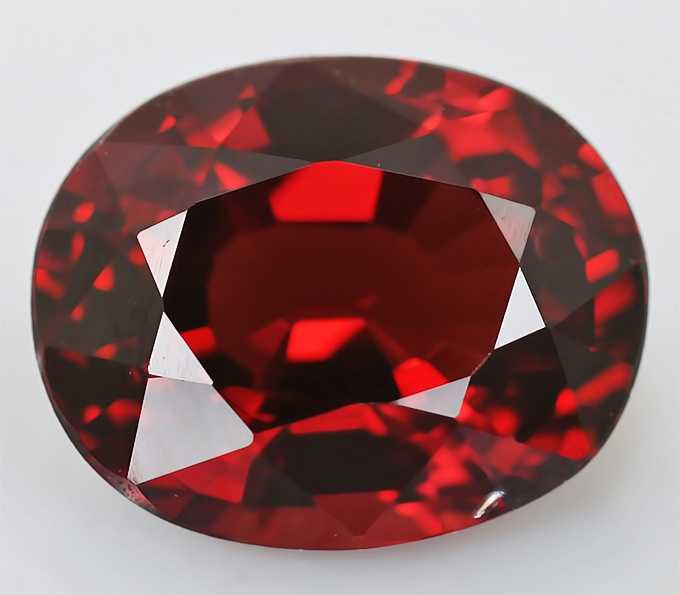 Альмандиновый цвет. Лал-шпинель камень. Рубиновая шпинель камень. Красная шпинель камень. Рубин турмалин шпинель александрит.